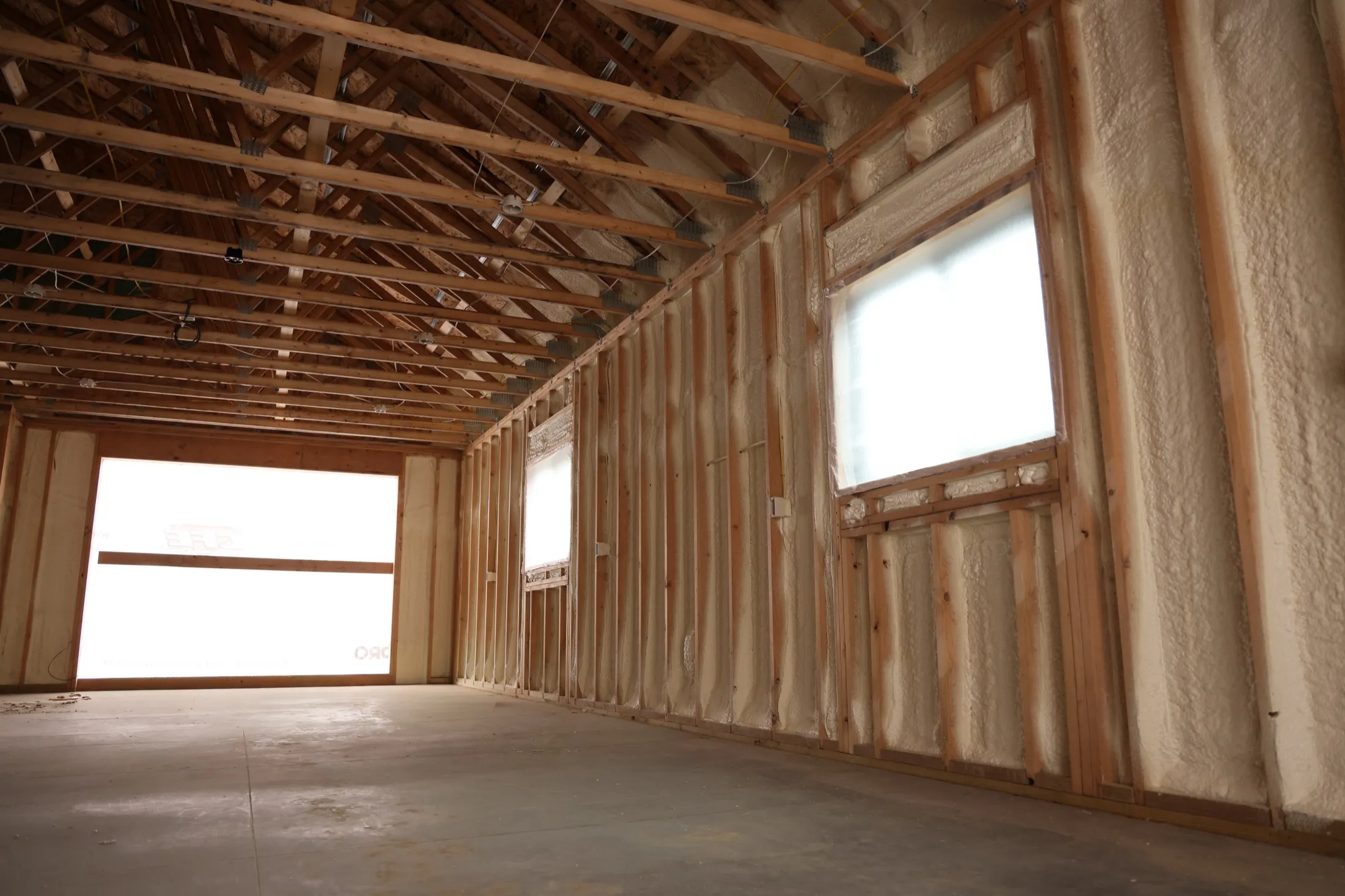 Foam conforming to a framing assembly
